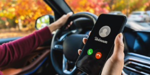 A person holds a phone showing an unknown caller, illustrating no caller id meaning.